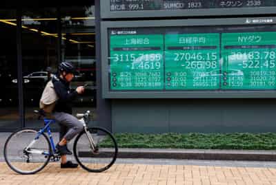 Image for Stocks advance, U.S. dollar retreats as China drops quarantine rule