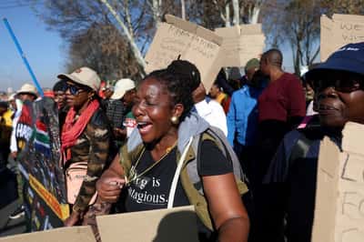 Image for South African anti-migrant protests turn violent, with cars torched, gunshots fired