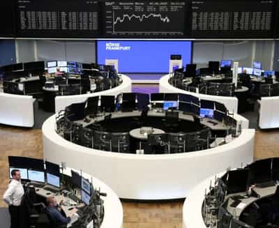 Image for Banks, commodity stocks lift European shares as markets await ECB meet