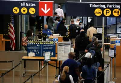 Image for Exclusive: US forming expert groups on safely lifting global travel restrictions