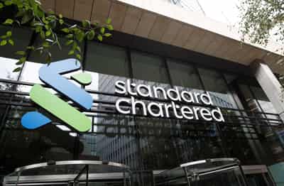 Image for StanChart lowers income target, launches $1 billion share buyback as profit jumps 18%