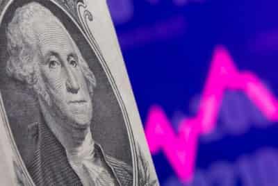 Image for Dollar hovers near one-month high with market frozen before Fed test