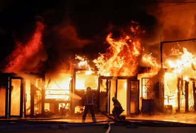 Image for Russia attacks Kyiv overnight, injuring three, Ukraine officials say