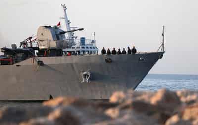 Image for Italian ship carrying migrants picked up offshore reaches Albania