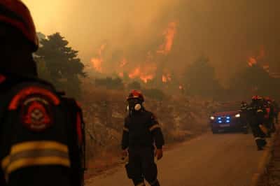 Image for Greek firefighters battle wildfire northwest of Athens for fourth day
