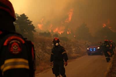 Image for Greek firefighters battle wildfire northwest of Athens for fourth day