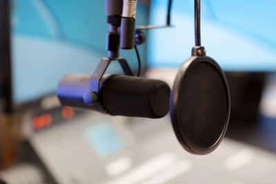 Image for “The Pandemic, Consolidation, and a Surge in Ad Spending: Reflection on a Year in Podcasting.”