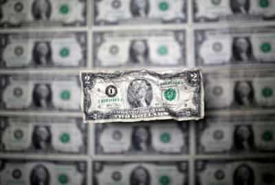 Image for Dollar dips as traders focus on US rate cuts next year
