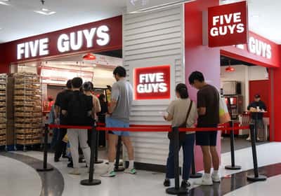 Image for From coffee to hotpot, brands race to grab a bite of China's growing burger market