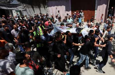Image for Gazans mourn aid worker killed by Israel who brought them the World Cup