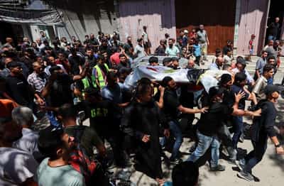 Image for Gazans mourn aid worker killed by Israel who brought them the World Cup