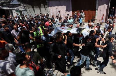 Image for Gazans mourn aid worker killed by Israel who brought them the World Cup