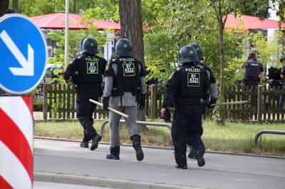 Image for Man critically injured in apparent hostage situation at German bank