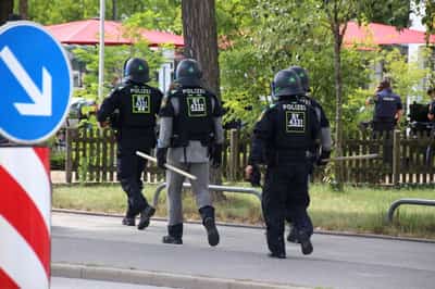 Image for Man critically injured in apparent hostage situation at German bank
