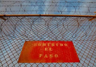 Image for Thousands of migrants cross into Spain's Ceuta on foot, EFE reports