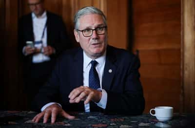 Image for UK business minister says he has no reason to think PM Starmer will resign on Monday