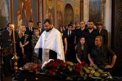 Image for Ukraine buries reporter who died in Russian captivity, urges release of others
