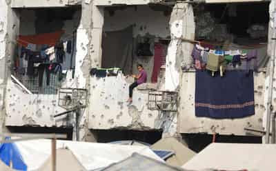 Image for Gaza storms bring flooding, sewage and misery in tent camps