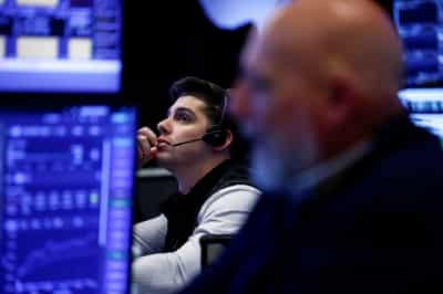 Image for Stocks slump, bonds leap as AI giants' spending spooks investors