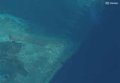 Image for Exclusive-Satellite images show suspected structure at disputed South China Sea atoll, but later gone
