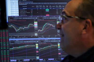 Image for Wall Street indexes fall as Meta, Microsoft drag, along with Fed rate concerns