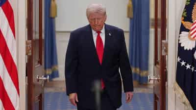 Image for Trump says US forces are 'clearing' Strait of Hormuz