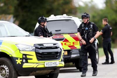 Image for Factbox-What is known about arrests at US airbase in Britain
