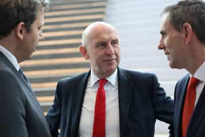 Image for Asked on bank tax, UK's Healey stresses sector's broader contribution