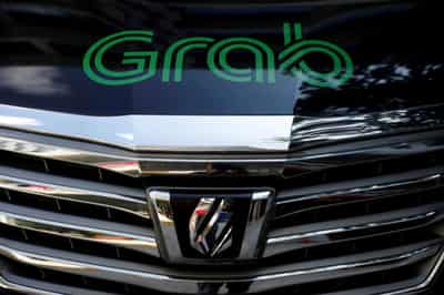 Image for Exclusive: Grab considering secondary Singapore listing after U.S. SPAC merger &#8211; sources