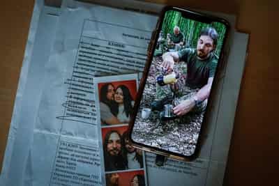 Image for Ukraine struggles to identify thousands of soldiers' remains as relatives ache for news