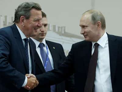 Image for Former German Chancellor Schroeder celebrates Putin's birthday at president's home