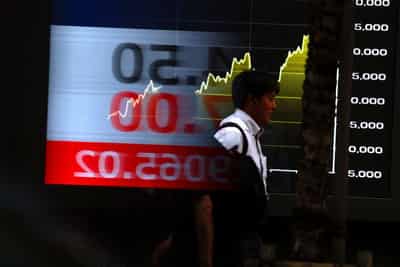 Image for Nasdaq sets record high, oil dips on improved crude flows