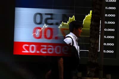 Image for Tech rally boosts Asian stocks, dollar firms on rate-hike wagers