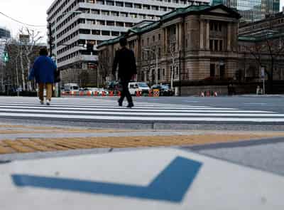 Image for Stocks make little progress, dollar rises against yen after BoJ decision