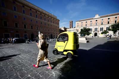 Image for Italy halts Poste stake sale as post office shifts focus to TIM revamp