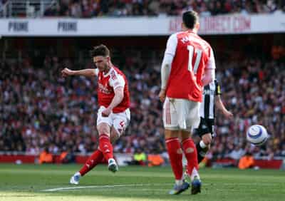 Image for Soccer-Arsenal get job done as top-five fight set for photo finish