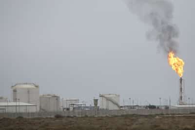 Image for Iraq approves 'amicable settlement' with Russia's Lukoil over transfer of operations of giant field