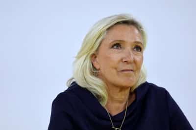 Image for Le Pen eyes bond markets with bigger spending cuts pledge if far right win presidential vote