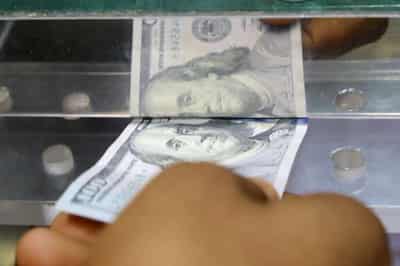 Image for Dollar recovers ground as jobless claims data helps