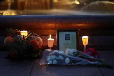 Image for At Australian and UK vigils, Charlie Kirk supporters say death won't kill his message