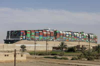 Image for Insurer of ship that blocked Suez Canal says reduced claim still high