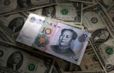 Image for Dollar falls after stronger-than-expected retail sales data, yuan falls to 9-month low