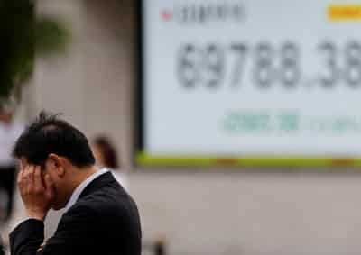 Image for World stocks fall in semiconductor rout; oil rises on Middle East escalation