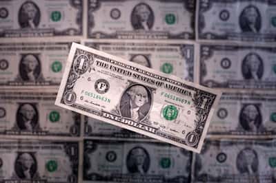 Image for Dollar retreats from 18-month high despite hot CPI as Fed officials temper hike bets