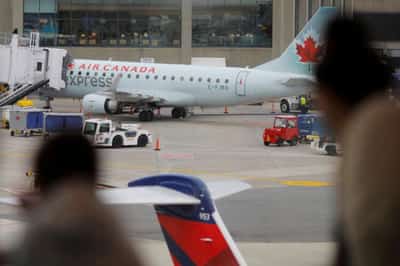 Image for Exclusive-Canada to ease travel requirements as COVID cases decline – source