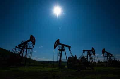 Image for Oil settles near five-year low amid ample supply, Russia-Ukraine progress 