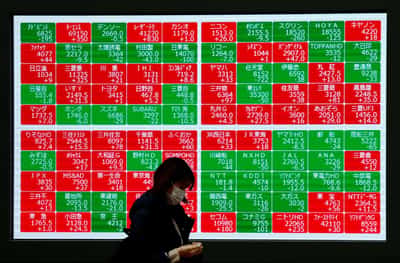 Image for Asian shares subdued, yen hits record low versus euro