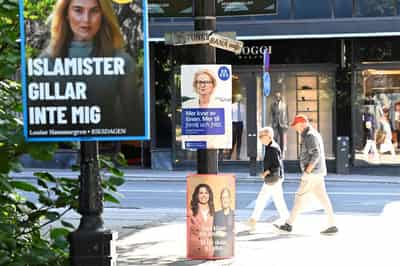 Image for Sweden's ruling coalition trails in poll, but closes gap on centre-left opposition