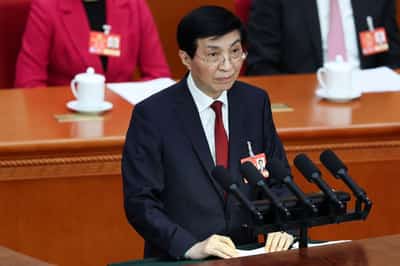 Image for Top China official says peaceful 'reunification' with Taiwan is best path forward - Xinhua