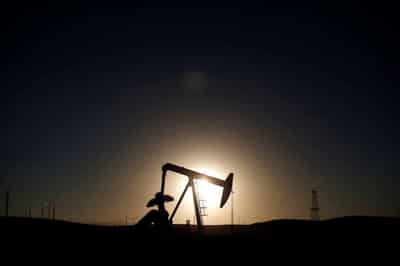 Image for Oil prices settle lower on nagging worries about Chinese demand